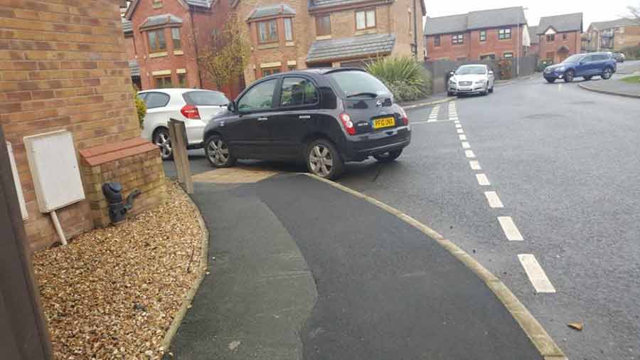 New Driveway Rule Now in Effect; Every UK Household Must Comply or Face Fines 3 car parked on a dropped kerb blocking part of a pavement